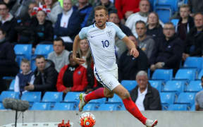 International football friendly match, England versus Turkey. Harry Kane controls the ball on the left wing.