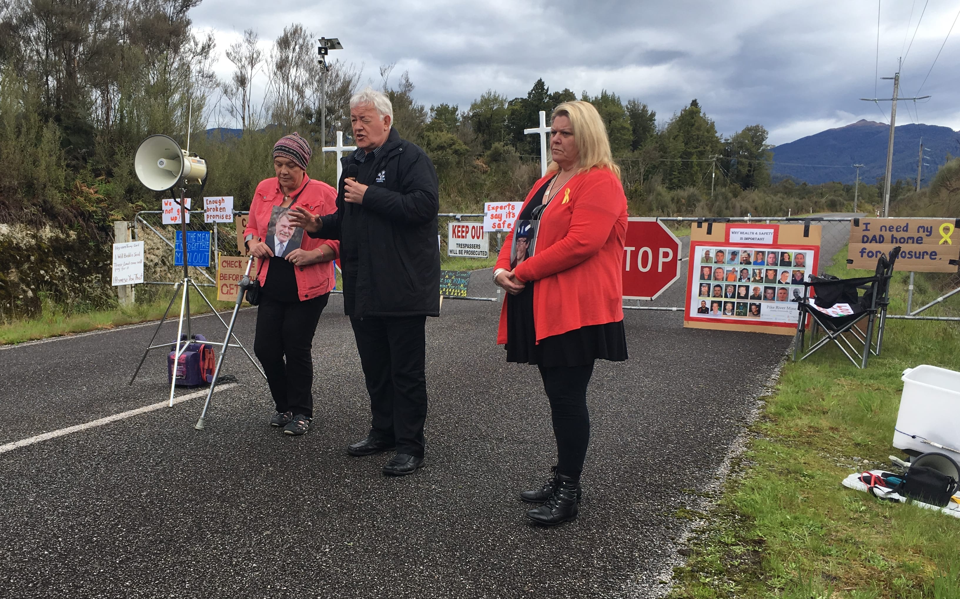 Protesters Anna Osborne, Bernie Monk and Sonya Rockhouse block the Pike River gate.