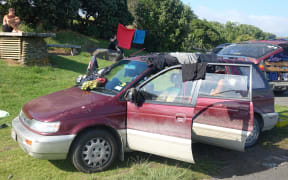 Washing strewn over a freedom campers' vehicle.