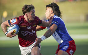 Highlanders wing Michael Manson.