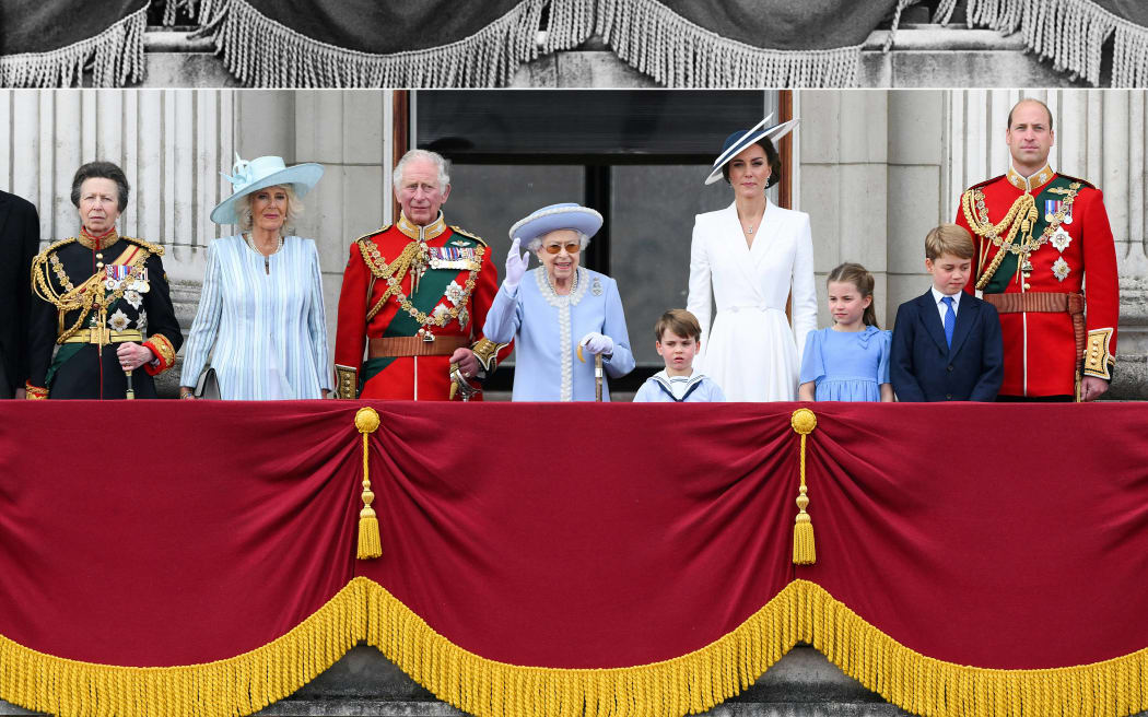 This combination of pictures created on June 2, 2022 shows (Top) Britain's Queen Elizabeth II (2nd L), accompanied by Prince Philip, Duke of Edinburgh (C), Prince Charles (3rd L), Princess Anne (C), Queen mother Elizabeth (3rd R) and Princess Margaret appearing on the balcony of Buckingham Palace, on her Coronation day, on June 2, 1953 in London; and (Down) Britain's Queen Elizabeth II (C) standing with from left, Britain's Princess Anne, Princess Royal, Britain's Camilla, Duchess of Cornwall, Britain's Prince Charles, Prince of Wales, Britain's Prince Louis of Cambridge, Britain's Catherine, Duchess of Cambridge, Britain's Princess Charlotte of Cambridge , Britain's Prince George of Cambridge, Britain's Prince William, Duke of Cambridge , to watch a special flypast from Buckingham Palace balcony following the Queen's Birthday Parade, the Trooping the Colour, as part of Queen Elizabeth II's platinum jubilee celebrations, in London on June 2, 2022