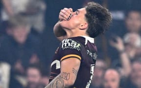 Reece Walsh of the Broncos celebrates after scoring a try during the round 27 NRL match between Brisbane Broncos and Melbourne Storm at Suncorp Stadium, on September 04, 2025, in Brisbane, Australia.