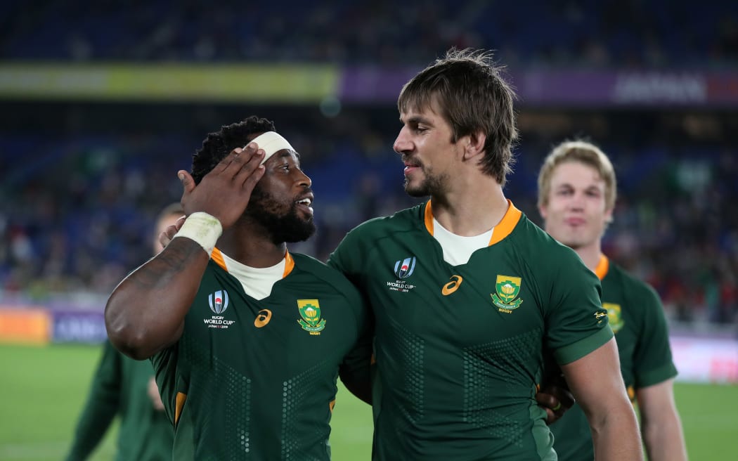 Siya Kolisi - South Africa captain celebrates with Eben Etzebeth following victory over Wales 2019.