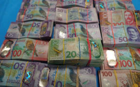 Nearly a $1 million in cash was seized by police in Operation Worthington.