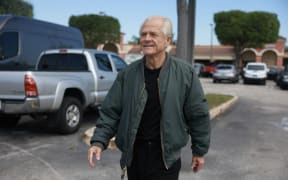 MIAMI, FLORIDA - MARCH 19: Former Donald Trump adviser Peter Navarro arrives for a press conference before turning himself into a federal prison on March 19, 2024, in Miami, Florida. Mr. Navarro, who was convicted of contempt of Congress last year, surrendered at a federal Bureau of Prisons facility to begin serving his four-month sentence after speaking to the media.   Joe Raedle/Getty Images/AFP (Photo by JOE RAEDLE / GETTY IMAGES NORTH AMERICA / Getty Images via AFP)