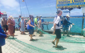 Unraveling the huge net on the marina wharf in Rarotonga proved impossible.