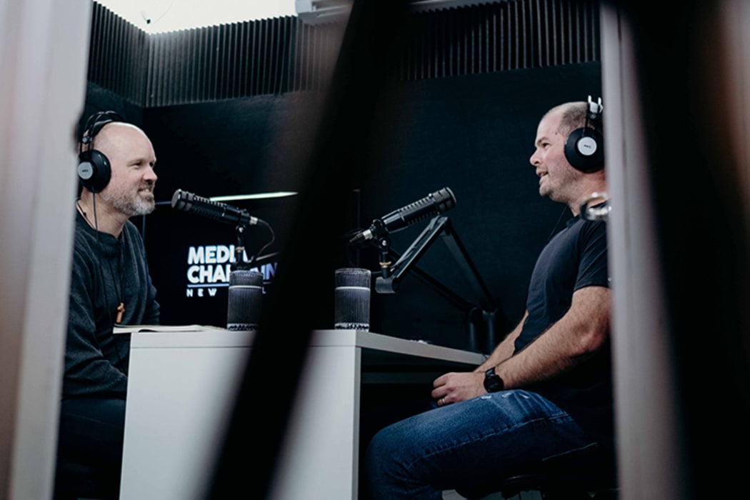 Reverend Frank Ritchie interviewing Jared Savage, investigative reporter at the New Zealand Herald