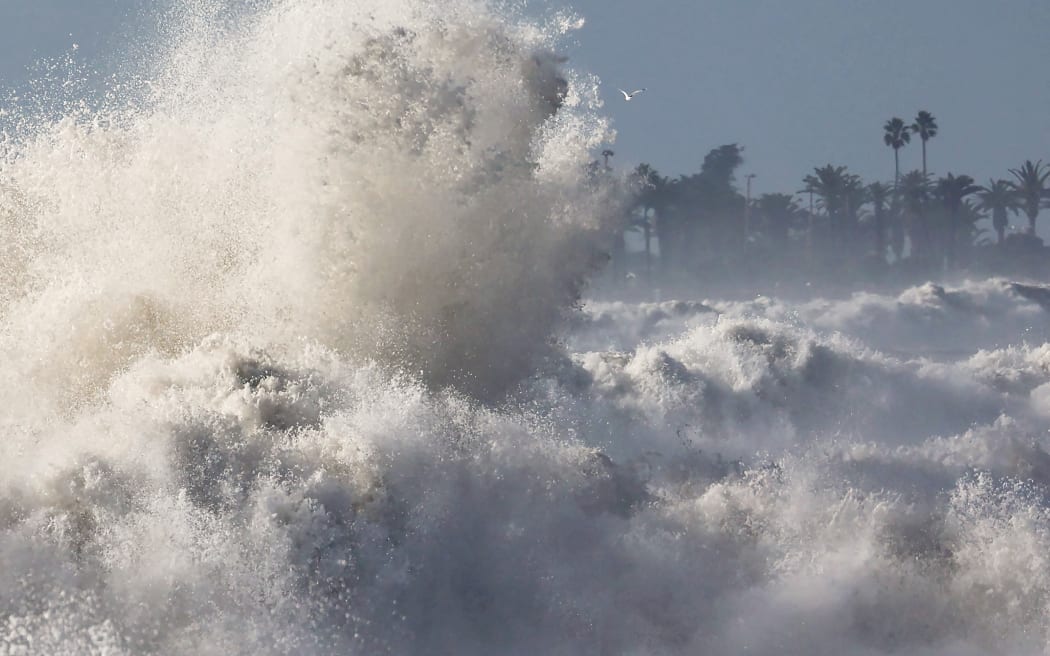 VENTURA, CALIFORNIA - DECEMBER 28: Large waves break near the beach on December 28, 2023 in Ventura, California. Dangerous surf churned up by storms in the Pacific is impacting much of California’s coastline with coastal flooding possible in some low-lying areas.   Mario Tama/Getty Images/AFP (Photo by MARIO TAMA / GETTY IMAGES NORTH AMERICA / Getty Images via AFP)