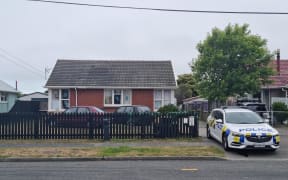 Police have raided two properties near the site of a stabbing at Bexley Park in Christchurch that left a man critically injured on 14 November.