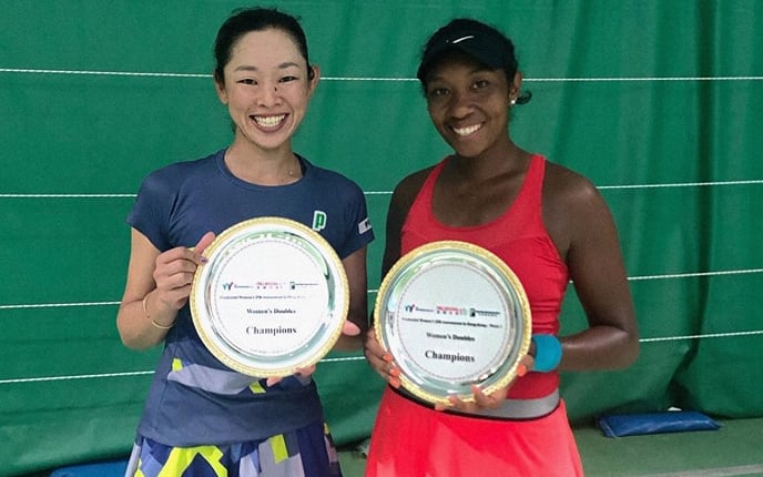 PNG's Abigail Tere-Apisah and doubles partner Junri Namigata celebrate winning the US$25,000 ITF event in Hong Kong.