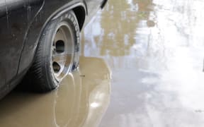 A classic car ruined by the flood waters in Henley, Dunedin