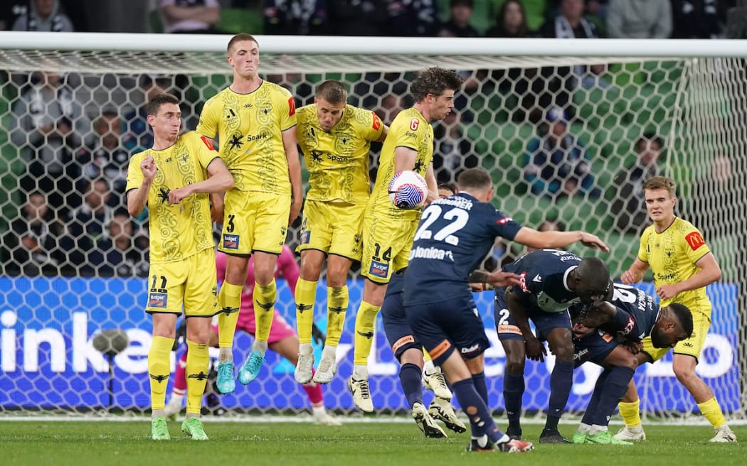 Bozhidar Kraev, Finn Surman, Scott Wootton and Alex Rufer of the block a free kick. Phoenix Melbourne Victory FC v Wellington Phoenix FC, Isuzu Ute Men’s A-League semi final 1 at AAMI Park, Melbourne, Australia on Sunday 12 May 2024.