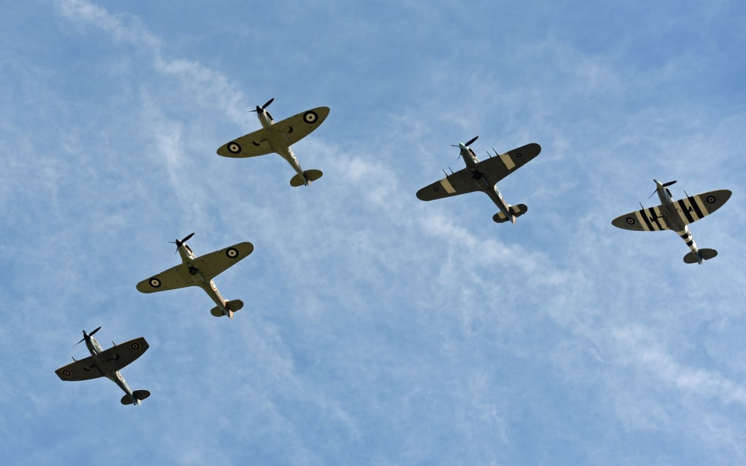 World War II planes fly over Buckingham Palace earlier this year.