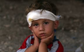An Iraqi Yazidi child at a makeshift shelter in the Kurdish city of Dohuk.