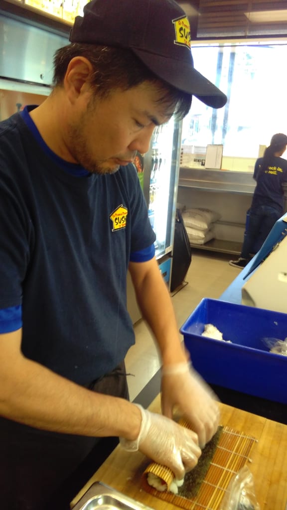 Hitoshi Nagata rolls sushi at St Pierre's in Johnsonville.