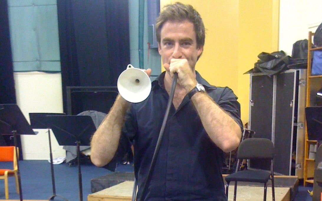 Huw Dan and his home-made garden hose trumpet.