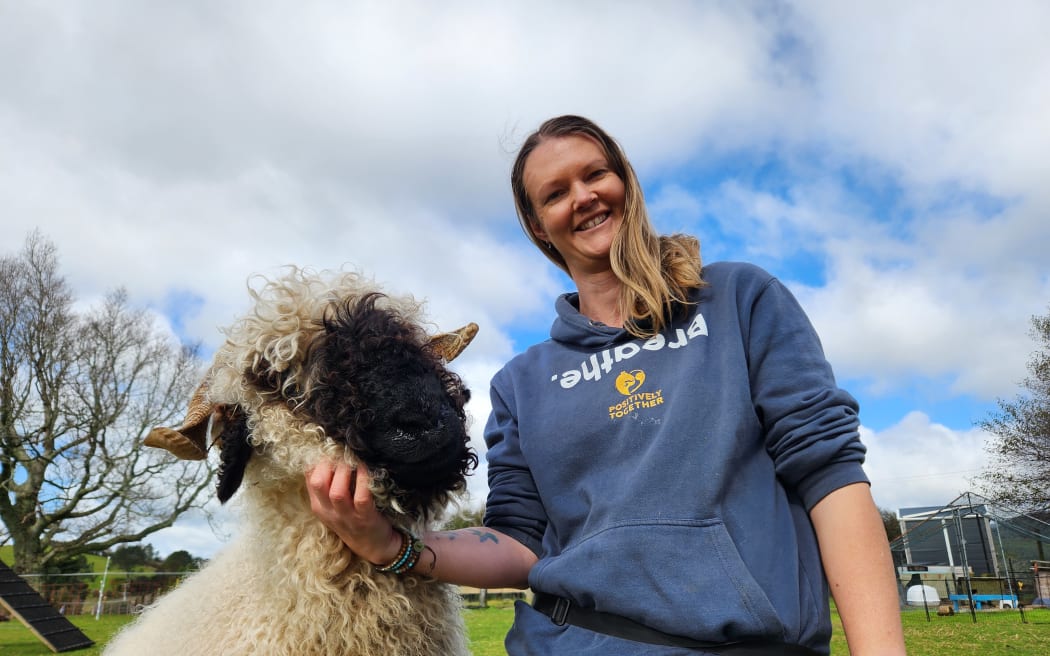 Bex with Barnaby the Valais Black Nose sheep, her "main man"