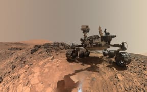 This NASA photo released June 7, 2018 shows a low-angle self-portrait of NASA's Curiosity Mars rover vehicle at the site from which it reached down to drill into a rock target called "Buckskin" on lower Mount Sharp.