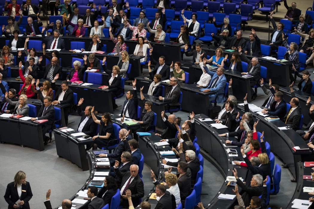 Law makers vote to recognise the Armenian genocide after a debate during the 173rd sitting of the Bundestag, the German lower house of parliament, in Berlin on June 2, 2016.