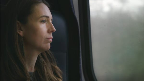 Jacinda Ardern stares out a window in a clip from a documentary - Prime Minister - about her tenure.