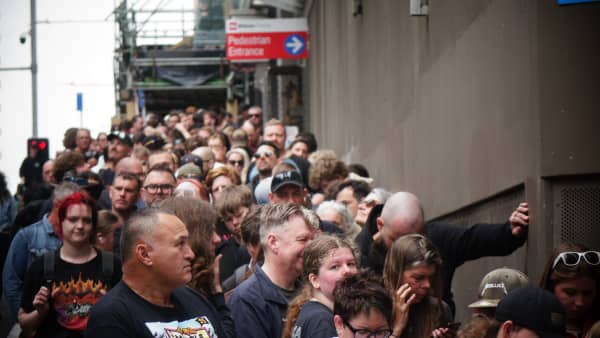 Metallica fans queue to buy merchandise in central Auckland before the band's gig at Eden Park.