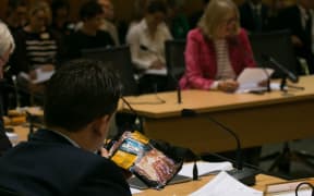 Labour MP Michael Wood rises to Sue Kedgley's challenge to identify the origin of a pack of bacon.