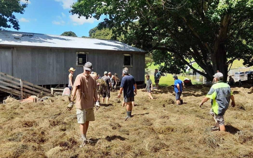 Teams in isolated country communities in Dartmoor spreading out hay to prevent combustion.