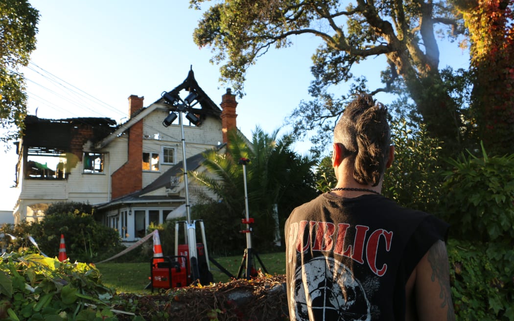 Benjamin Rees outside Parnell's City Garden Lodge, which was gutted by fire on 7 April, 2024. Rees said he had been provided accommodation at the lodge by WINZ after being homeless for a month.