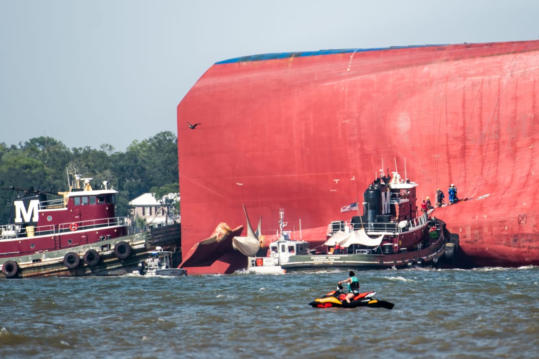 Emergency responders work to rescue crew members from a capsized cargo ship on September 9, 2019 in St Simons Island, Georgia.