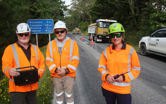 Buster Sandford (Downer), Mike Monigatti (Hiway Stabilizers) and Sasha Linton (Downer) at work on a section of the Paparoa-Oakleigh detour. Photo: Supplied / Northland Transportation Alliance