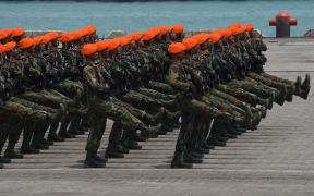 Indonesian military troops march in formation during an exercise in West Java province in 2015