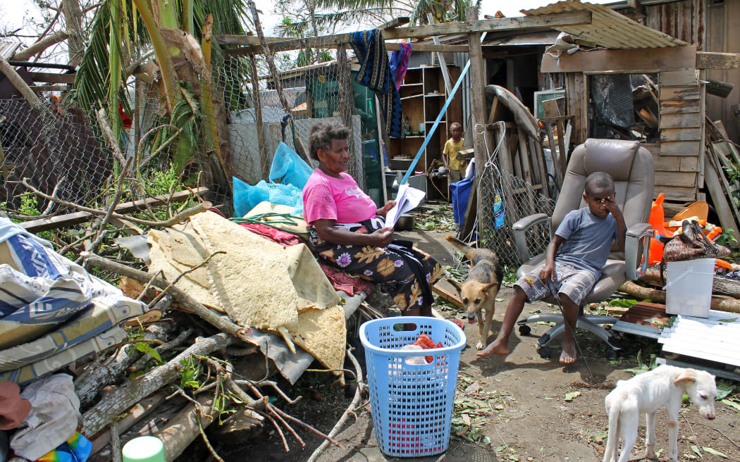Family in Nikinini community (mother Josephine, and children Angelica (12), Jacquie (9), Jessica (1) and Bojel (8). They have lost everything beacuse of Super Cyclone Pam. The cyclone has affected 60,000 children