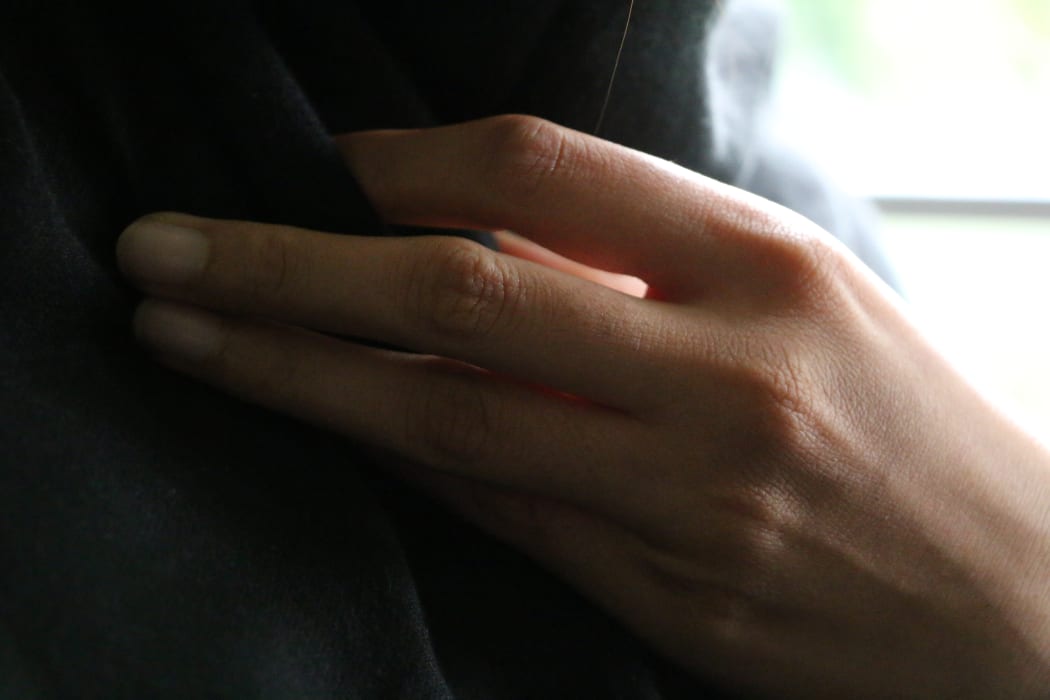 In hiding, a survivor speaks out.