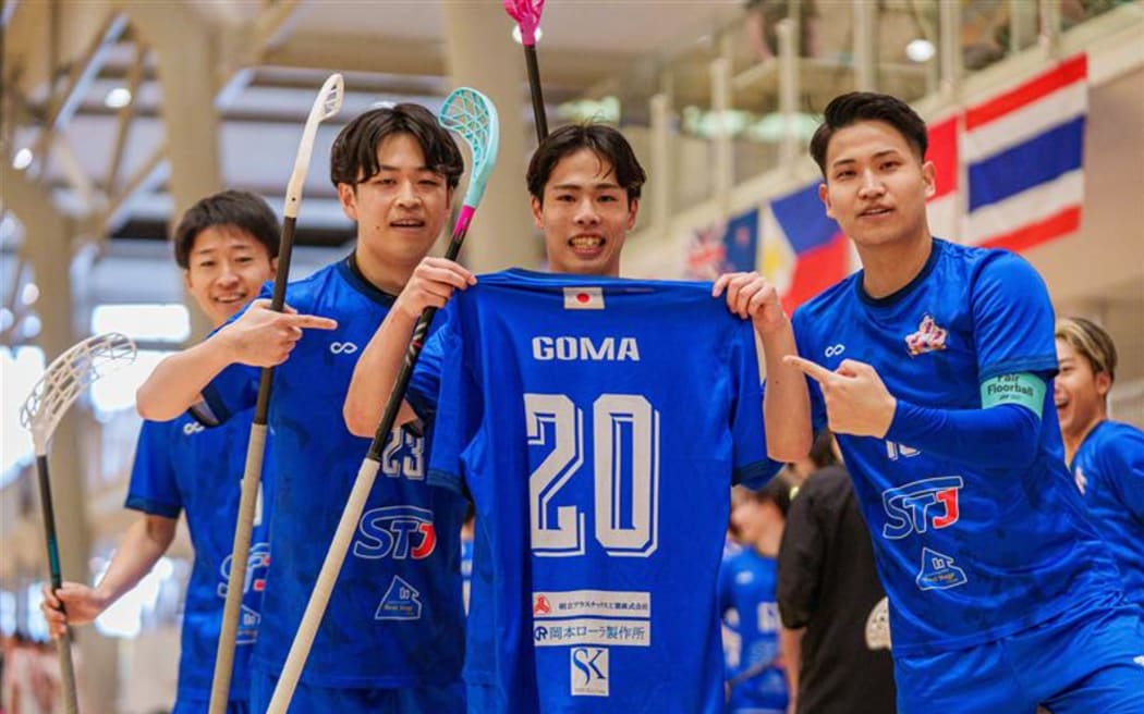 Japan celebrating first goal in first game in qualifier.