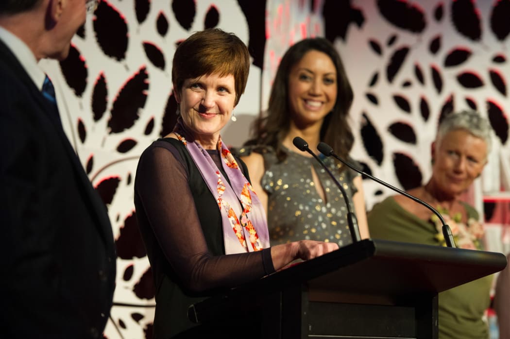 Hon Christopher Finlayson with Jill Trevelyan, winner of New Zealand Post Book of the Year 2014
