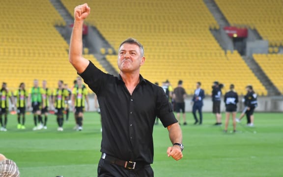Phoenix head coach Mark Rudan celebrates their win.