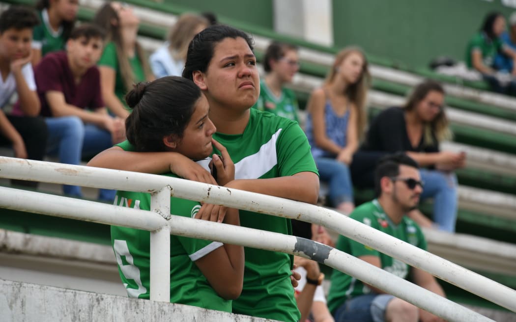 At the club's Arena Conda stadium in Chapeco, people gathered to pay tribute to the players.