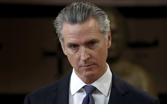 California Gov. Gavin Newsom looks on during a press conference at Friendship House Association of American Indians on January 16, 2026 in San Francisco, California. California Gov. Gavin Newsom joined San Francisco Mayor Daniel Lurie to announce new funding for homelessness and mental health efforts in the city of San Francisco. The governor announced more than $420 million in new state funding for San Francisco, Los Angeles, and San Diego as part of the state's HHAP 6 funding, which goes toward helping local programs end homelessness through interim or permanent housing and supportive services.