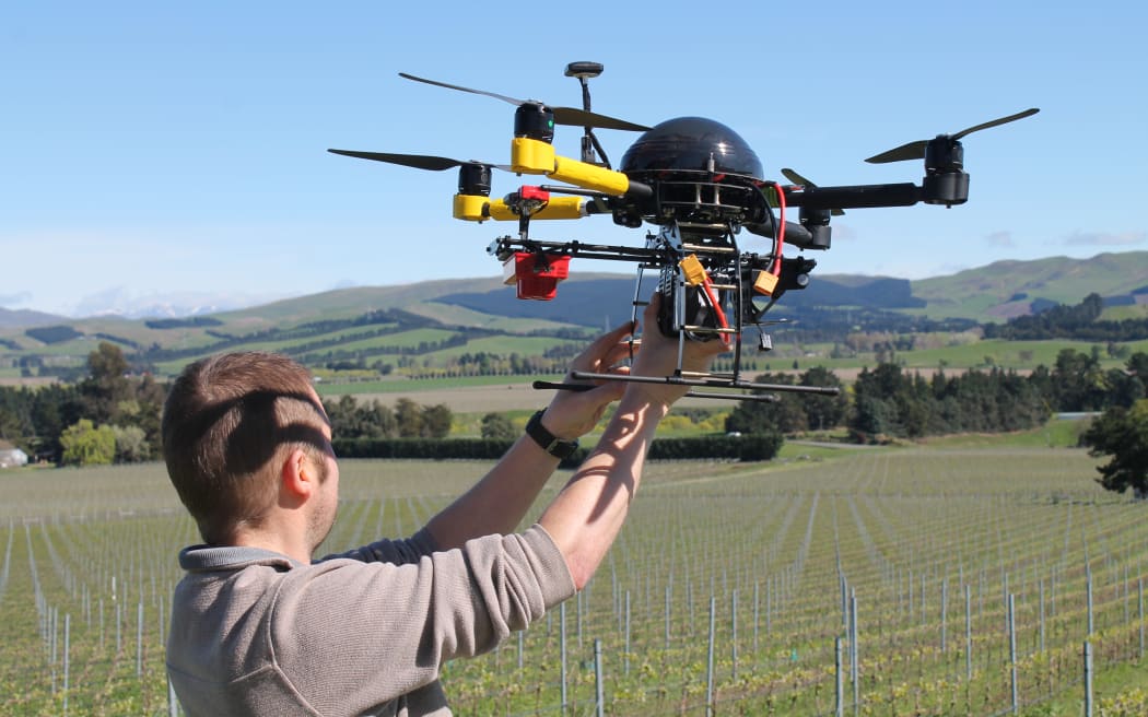 Rob Prileszky prepares to fly the quadcopter
