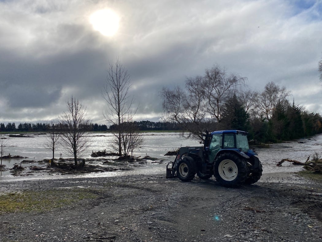 Laurence Rooney's tractor on the waterlogged farm.