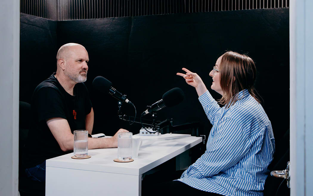 Reverend Frank Ritchie speaking with Stuff visual journalist Abigail Dougherty