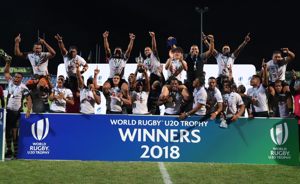 The Baby Flying Fijians lift the U20 Trophy.