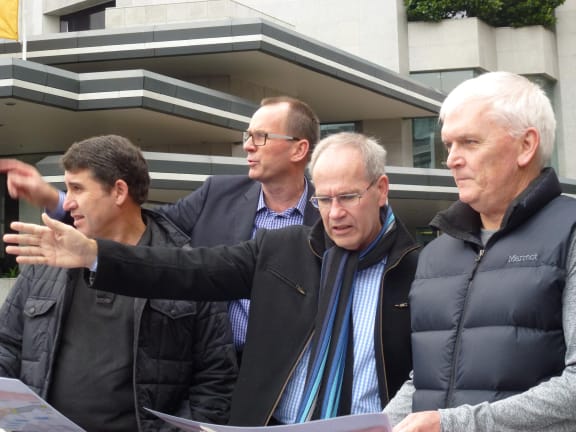 From left, Auckland Transport chair Lester Levy, rail link project manager Steve Hawkins, Mayor Len Brown and council chief executive Doug McKay discussing the route recently.