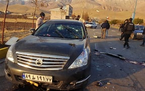 A handout photo made available by Iran state TV (IRIB) on November 27, 2020, shows the damaged car of Iranian nuclear scientist Mohsen Fakhrizadeh after it was attacked near the capital Tehran.