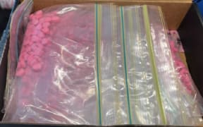 More than 1000 MDMA pills were seized.