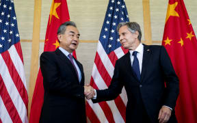 US Secretary of State Antony Blinken (R) shakes hands with China's Foreign Minister Wang Yi during a meeting in Nusa Dua on the Indonesian resort island of Bali on July 9, 2022. (Photo by Stefani Reynolds / POOL / AFP)