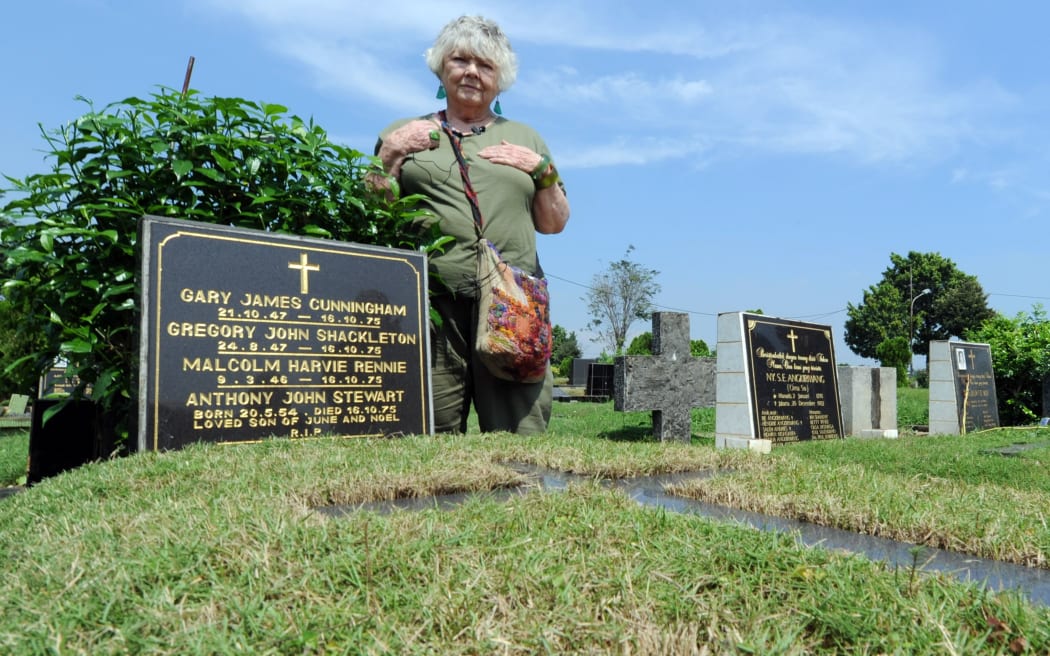 Shirley Shackleton, wife of late Australian journalist Greg Shackleton, stands by the grave in Jakarta where the five journalists were buried (2010).