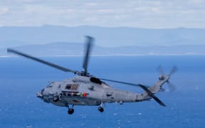 The Australian Defence Force says a Seahawk helicopter was forced to take evasive action after a Chinese helicopter "rolled towards" it.