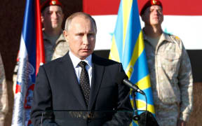 Russia's president Vladimir Putin on a suprise visit to Hmeimim airbase, near Latakiato, Syria.