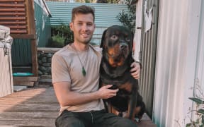 Ryan Tarawhiti-Brown and Chopper after the dog’s release in July 2022.